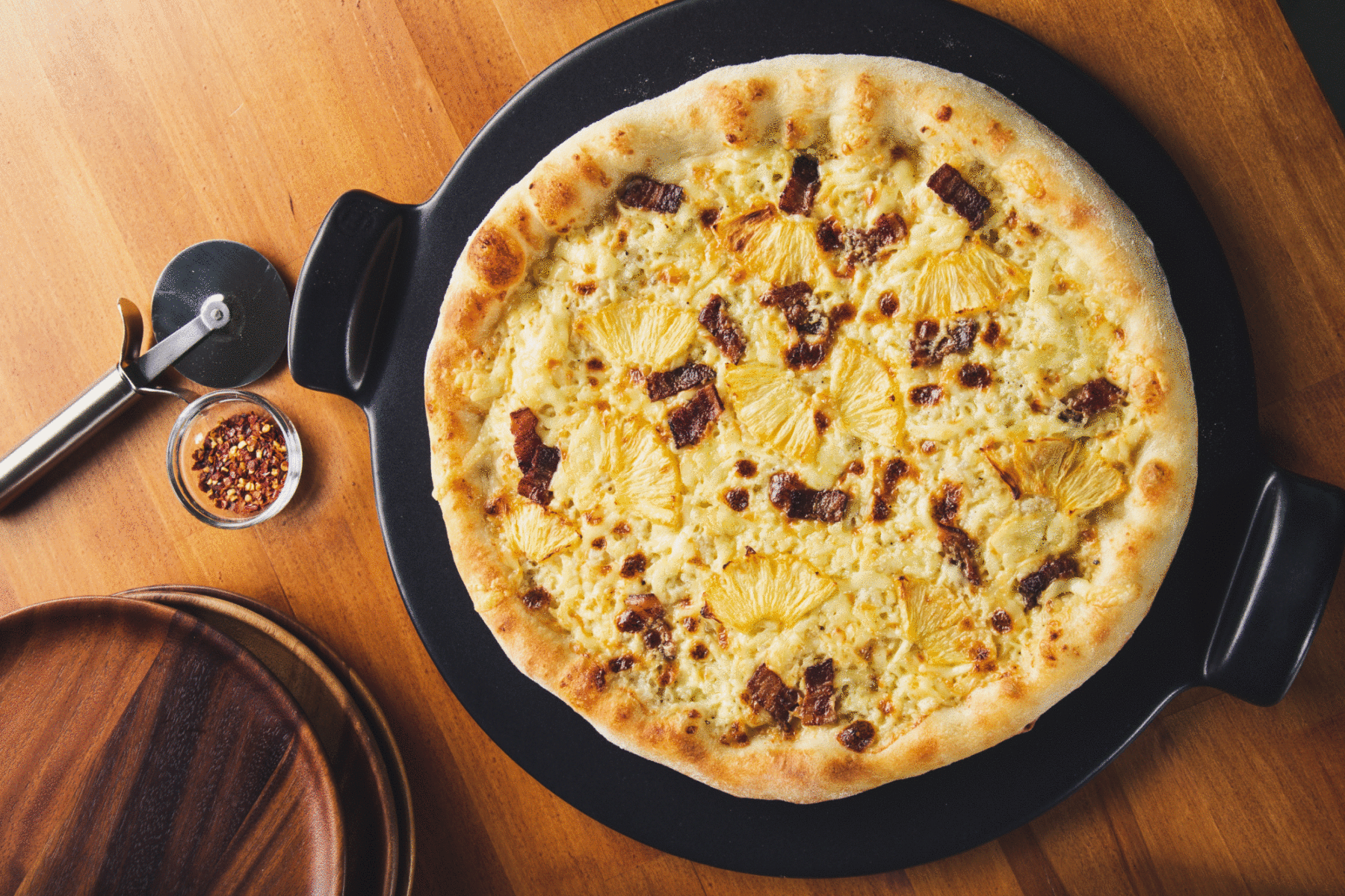 Le Crémeux Pizza with Bacon and Roasted Pineapple - Emmi USA