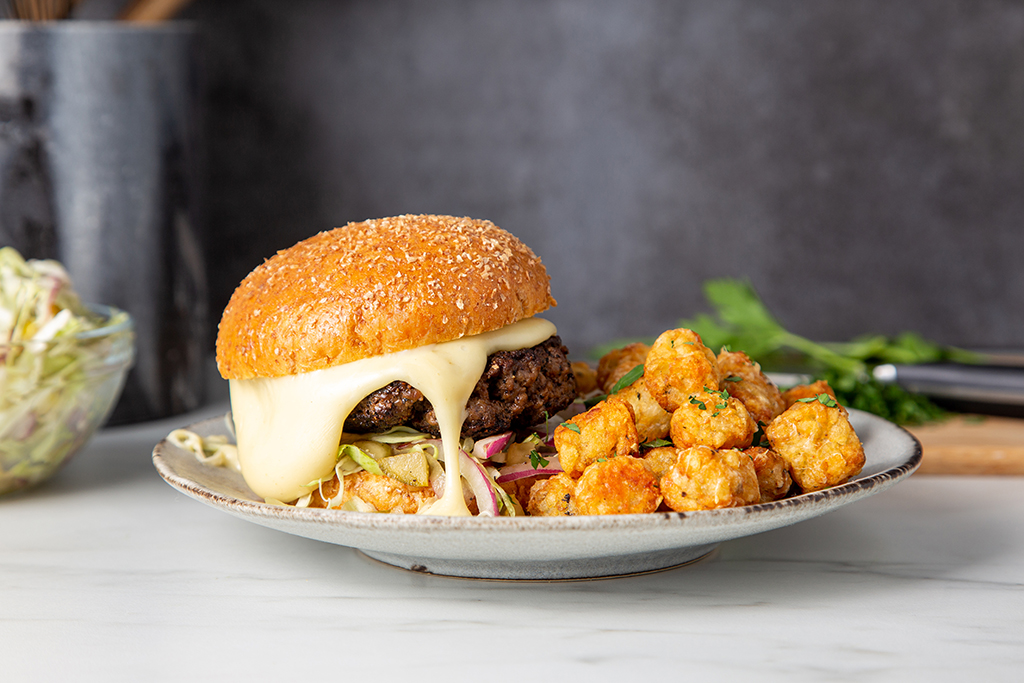 Fondue Burger with Pickle Slaw Emmi USA